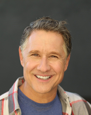 Smiling man with salt and pepper hair