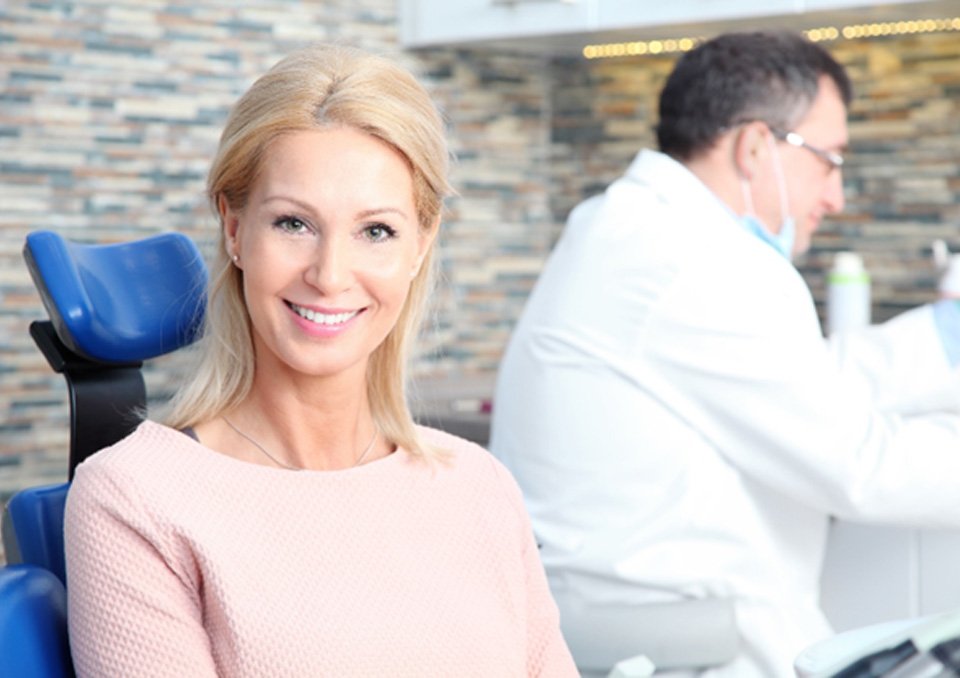 Woman with veneers in Richardson 