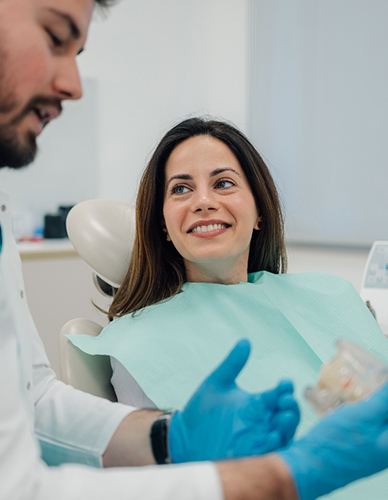 Woman smiling at the dentist