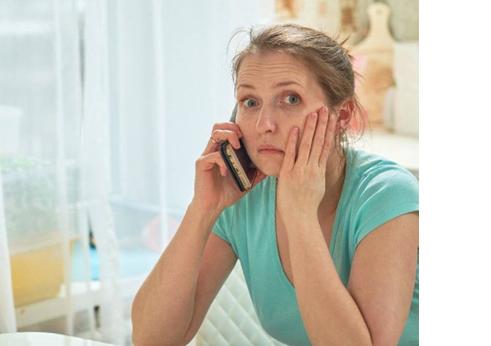 Concerned woman calling her Richardson emergency dentist