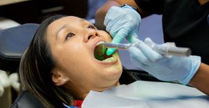 Dental patient receiving preventive dentistry