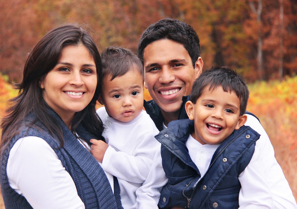 Family smiling after seeing dentist in Richardson