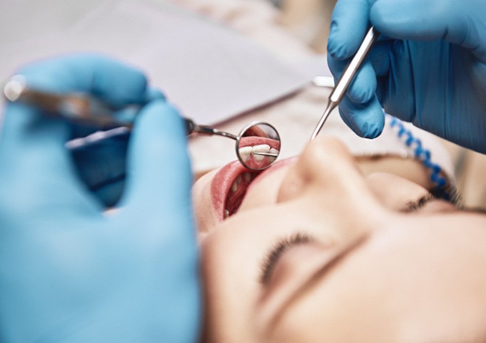 patient smiling during checkup