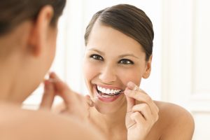Floss well for a healthy mouth and body is the advice given by Richardson dentist Dr. Stampe. 